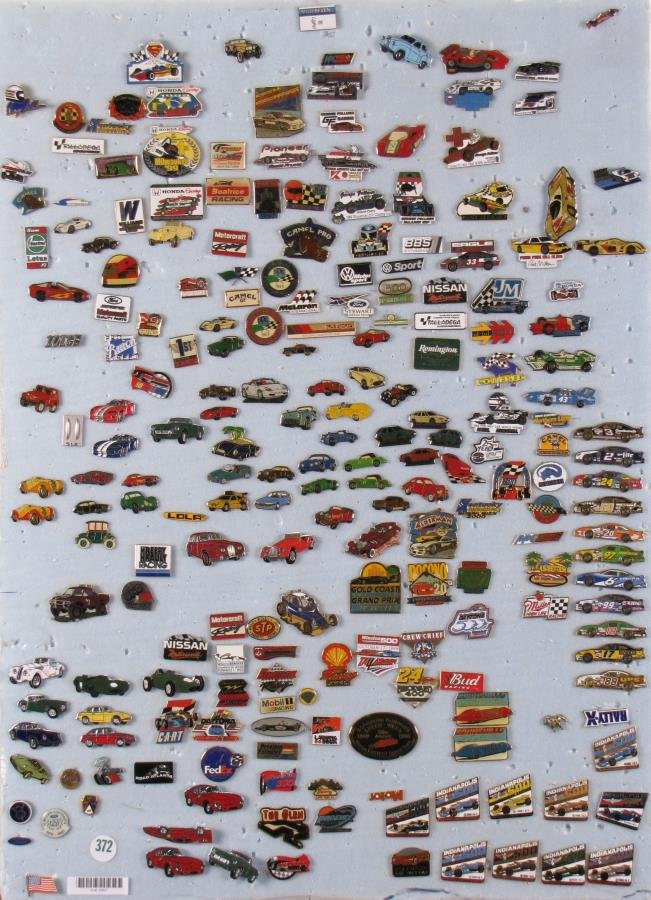 Collection of Racing and Automotive Pins: Collection of Racing and Automotive Pins, approximately 185 pins, various subjects including Nascar, Indy Car and sponsor pins; on foam board, 26" x 19"