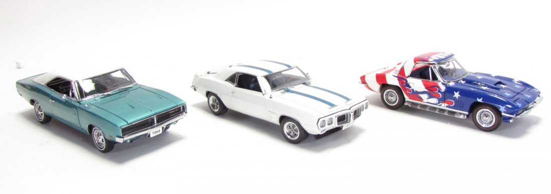 Three Danbury and Franklin Mint Die Cast Cars: Three Danbury and Franklin Mint Die Cast Cars, including: Danbury Mint 1969 Dodge Charger SE, limited edition serial number 1,665; 1969 Pontiac Trans Am; Franklin Mint 1967 Chevrolet Stars and Stripes