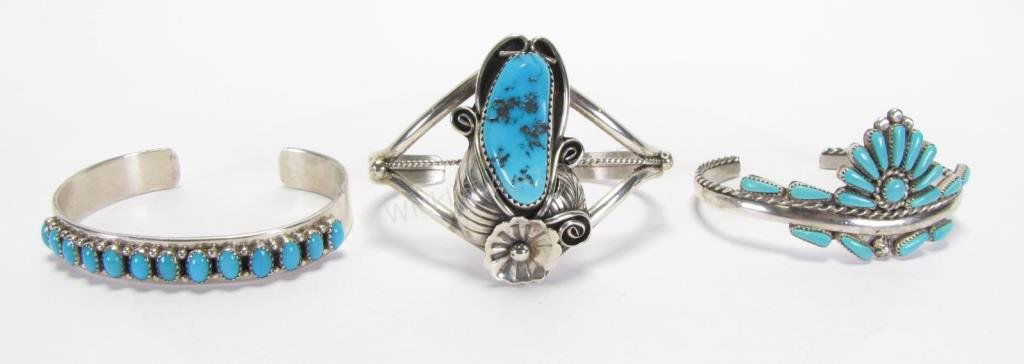 Three Sterling Turquoise Cuffs, Waatsa, Livingston: Three sterling silver turquoise cuff bracelets including Evans Waatsa with petit point sunrise design, 16 grams; a turquoise and sterling bracelet marked B, 23 grams; and a Livingston cuff bracelet wi