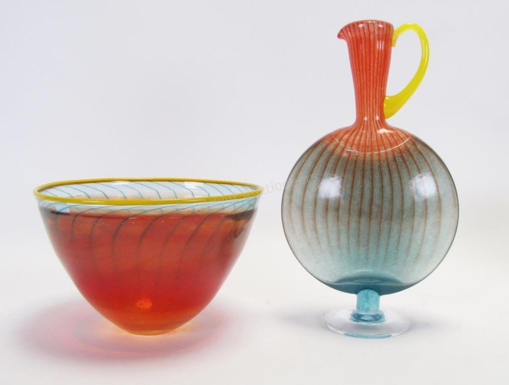 Kosta Boda Kjell Engman Art Glass Bowl and Ewer: Kosta Boda Kjell Engman Art Glass Bowl and Ewer, red glass bowl with blue stripes and yellow rim, signed on bottom "Kosta Boda, K.Engman, 59062", with original label; ewer with Mediterranean blue base