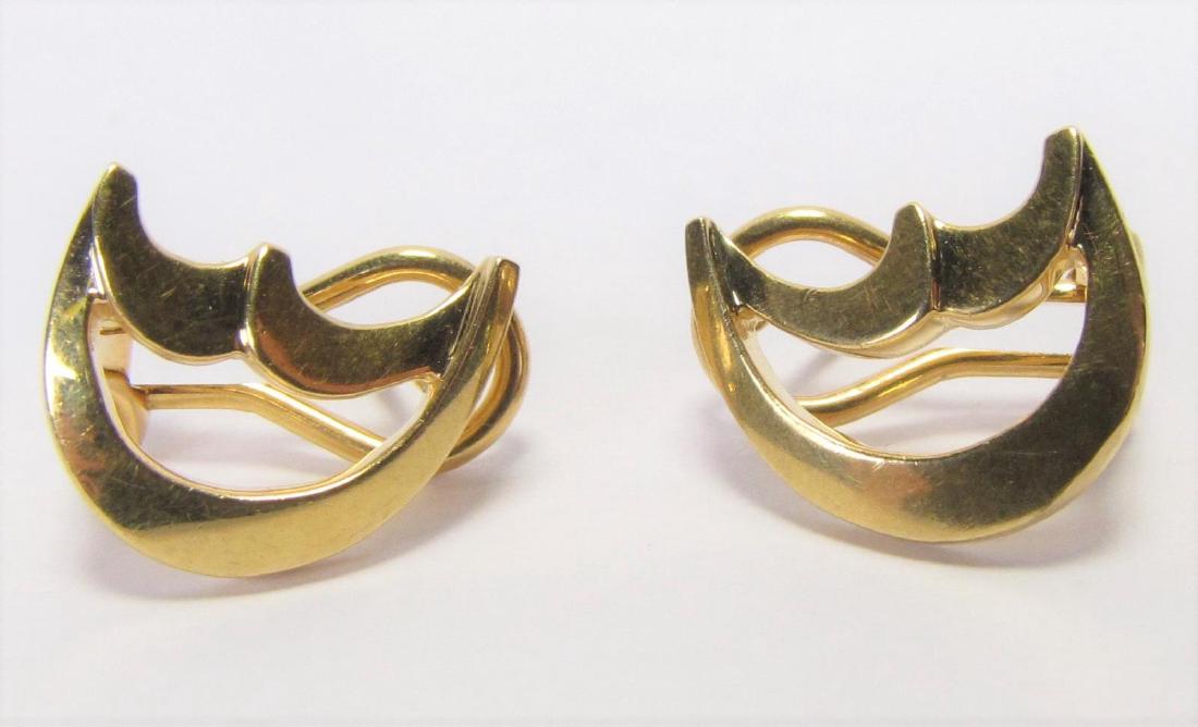 18K Tiffany Paloma Picasso Crescent Moon Earrings: A pair of 18K yellow gold Tiffany & Co. earrings by Paloma Picasso, in crescent moon design, with Omega post backs, 4.3dwt, approximately .56 inches long,