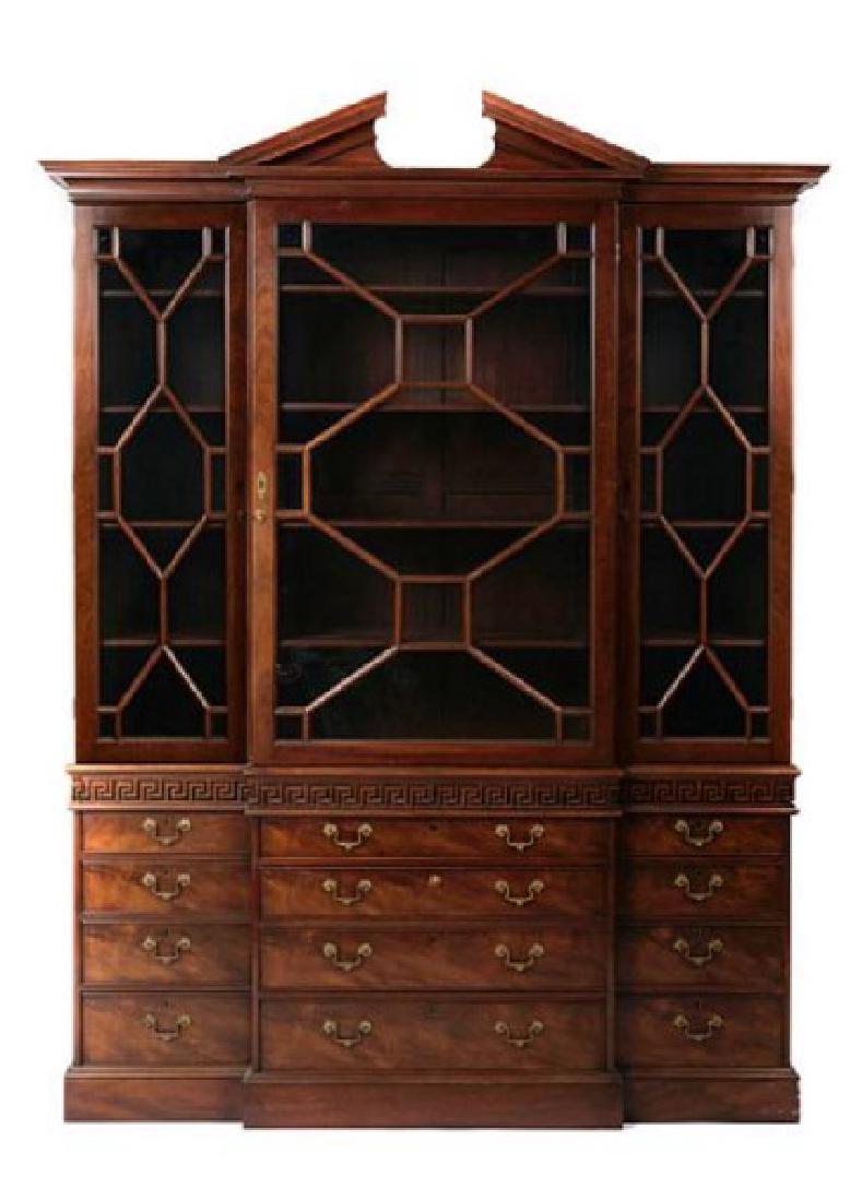 Kittinger Colonial Williamsburg Breakfront: A solid mahogany and mahogany veneer breakfront china cabinet by Kittinger, from the Colonial Williamsburg collection, style number CW158, three sections (base, cabinet top, cornice), three hidden dra