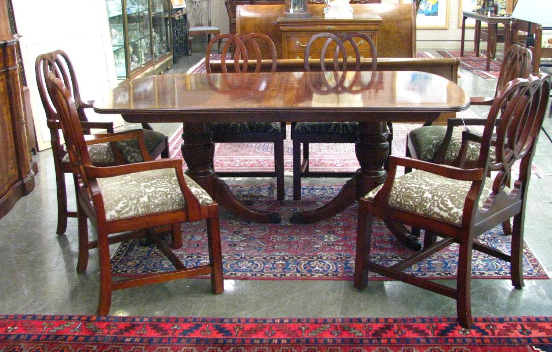 Bernhardt Dining Table and Chairs: A period-style dining table and chairs, by Bernhardt, mahogany with banded top on table, 44 x 74 x 30, plus (2) 18" leaves, includes 6 "Irish" arm chairs with padded seats, nice condition