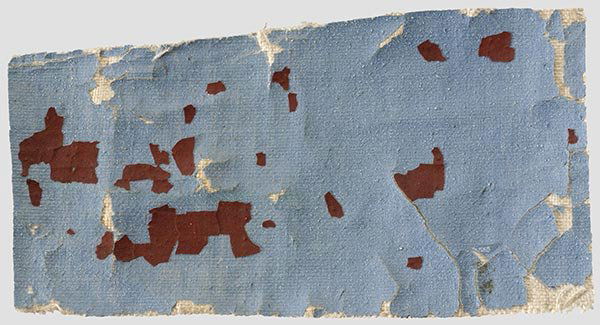Manfred Freiherr von Richthofen: a fabric fragment of his last triplane, the Fokker Dr. I 425/17 Blue-grey linen with traces of red colouring. 85 x 44 mm. Enclosed a copy of C.M. Sadler's cover letter addressed to Günther Josten and