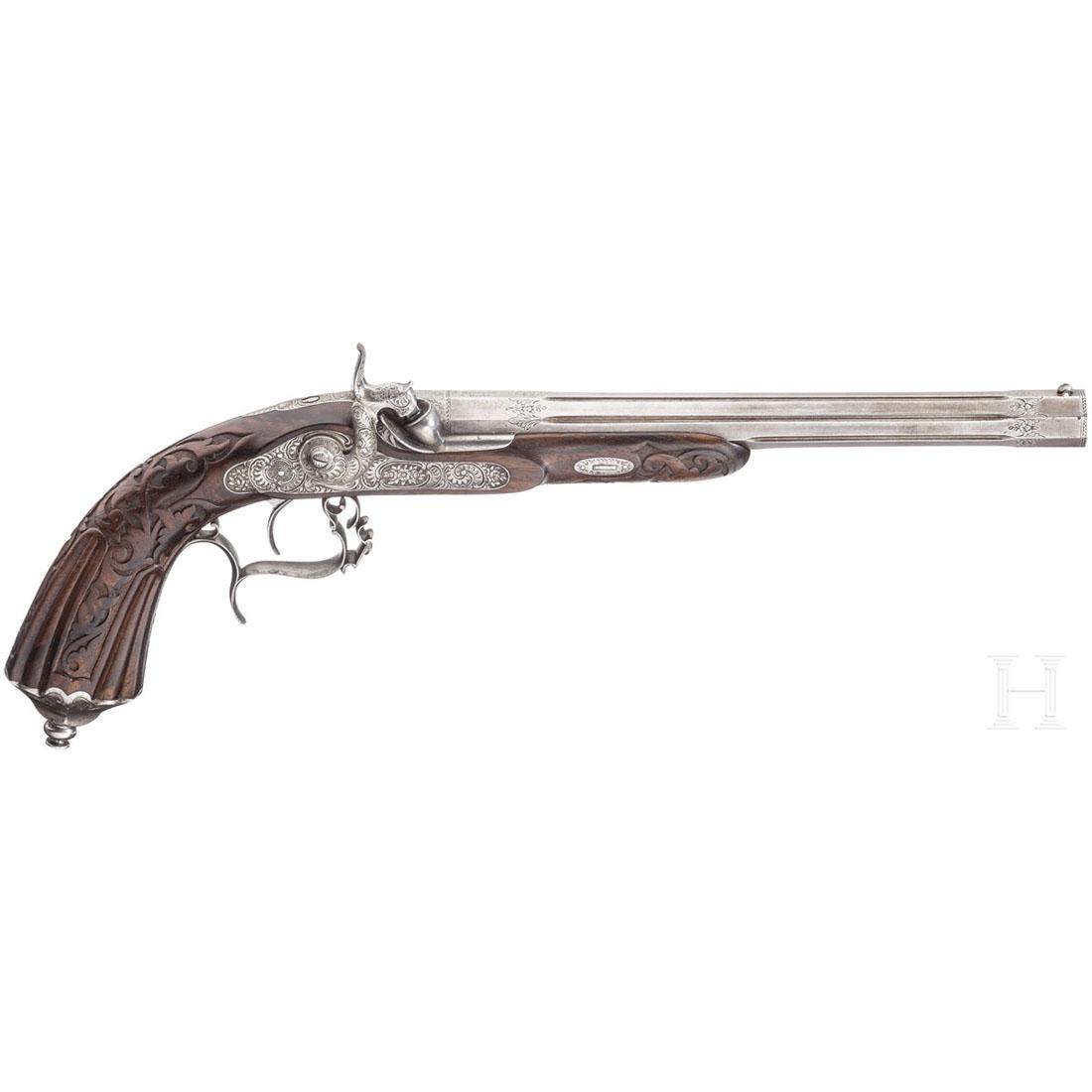 A percussion target pistol, Leon Leroux, paris, ca.: Achtkantiger, teils kannelierter und gravierter Lauf mit zehnfach gezogener Seele im Kaliber 11,5 mm. Ãœber der Kammer gravierte Signatur "L. Leroux Ã Paris". Fein graviertes Schwanzschraubenblat