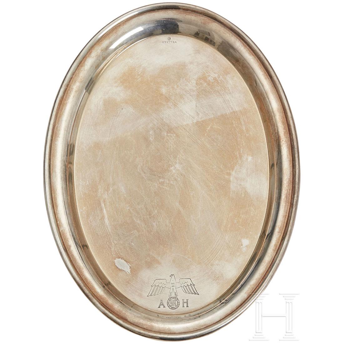 Adolf Hitler - a Small Serving Tray from his Personal: A small, oval tray with national eagle, slightly spreaded wings and the initials "AH" on the surface, stamped "Wellner", and "12" on the top surface. Dimensions ca. 21 (length) x 15 (width) cm. Achtun