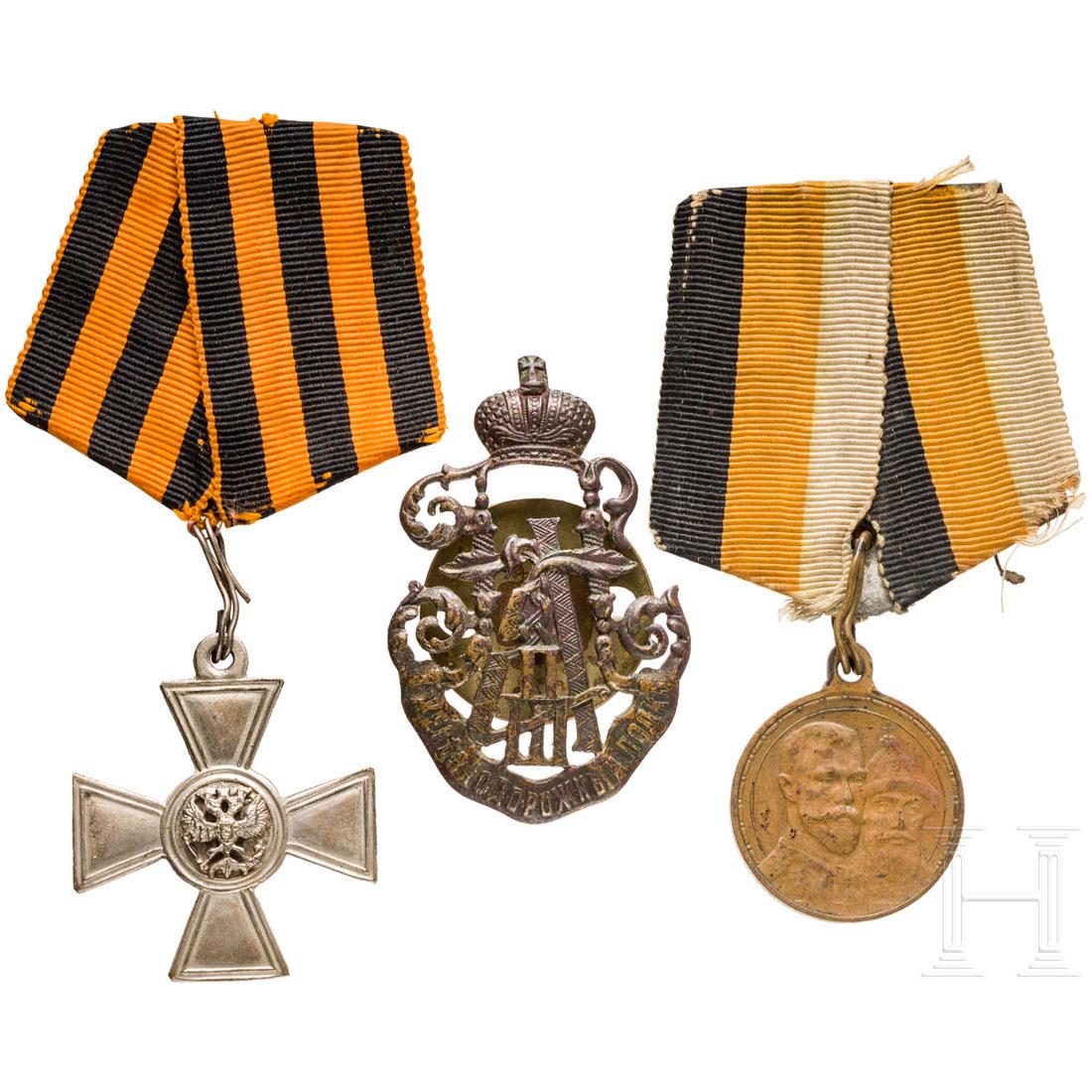 Badge of the 1st railway regiment, St. George cross for: Bronze. Rs. Reste der Versilberung. Schraubscheibe spÃ¤ter. MaÃŸe 55 x 36 mm. St. Georgs-Orden, Kreuz fÃ¼r Nichtchristen, beidseitig mit aufgelegten russischen Doppeladlern, am Bandabschnitt. Zu