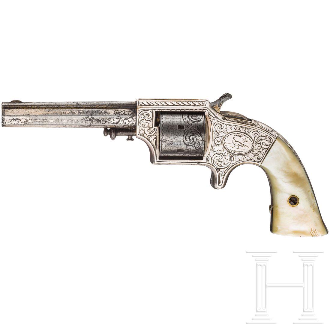 A Nimschke engraved Eagle Arms cupfire revolver: Kal. .30 cupfire, Nr. 7858, SA only, blanker 3,5 Zoll Oktagonallauf. SechsschÃ¼ssig. Auf dem Lauf Firmierung "Eagle Arms Co. New York". Versilberung, am Lauf ca. 30 %, am Messingrahmen ca. 80 %. Kle