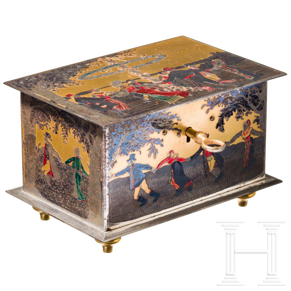 A fine Swedish iron Art Deco casket, polychomely: On the lid displaying people, dancing in traditional Swedish dress around a Maypole, on the sides the same kind of people dancing between trees. The bottom marked "A. Bol. Ornamentik Eskilstuna". The