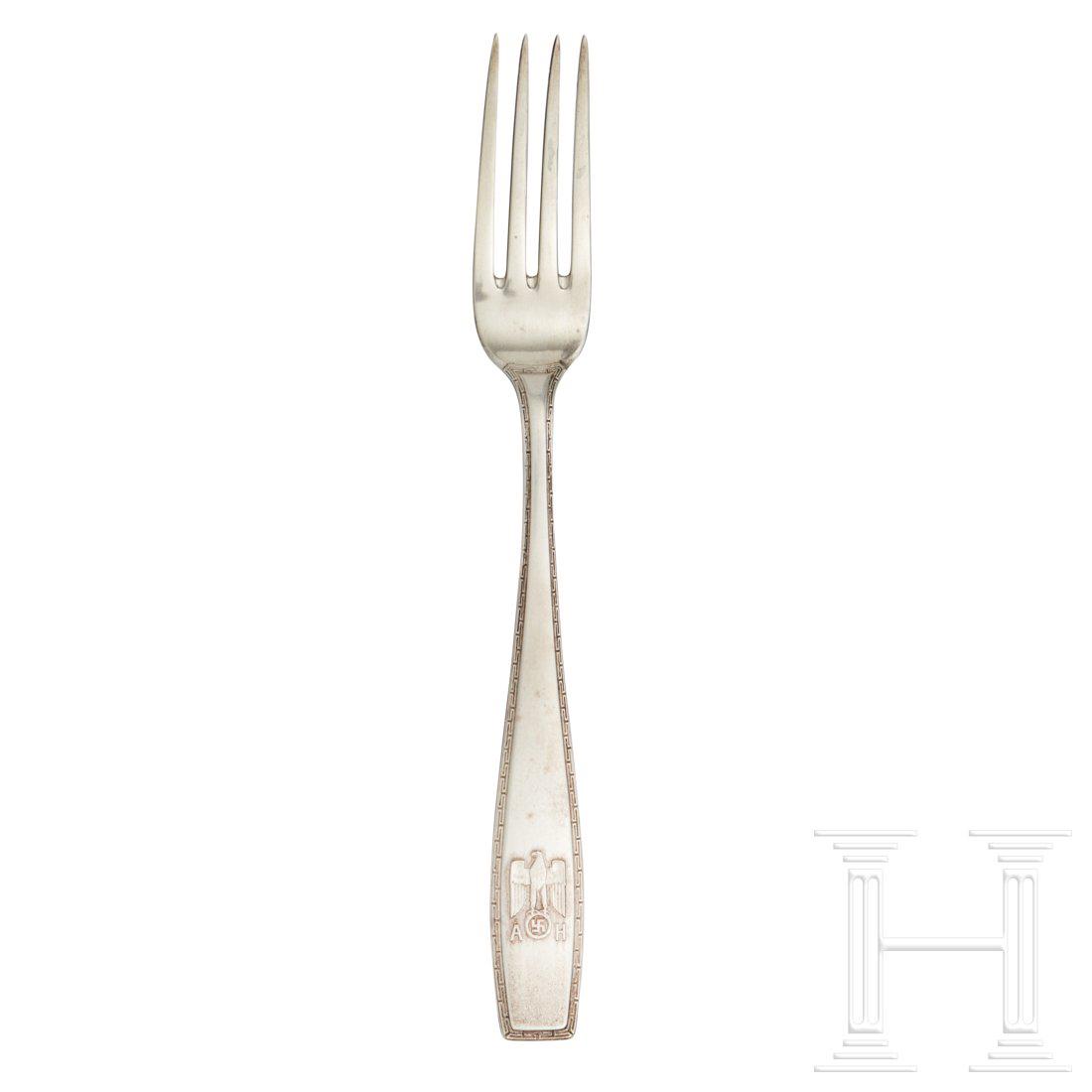 Adolf Hitler â€“ a Dinner Fork from his Personal Silver: So called â€œformal pattern” with raised national eagle, the initials â€œAH” and continuous Greek key pattern along edges. Reverse stamped â€œ800” next to crescent, crown