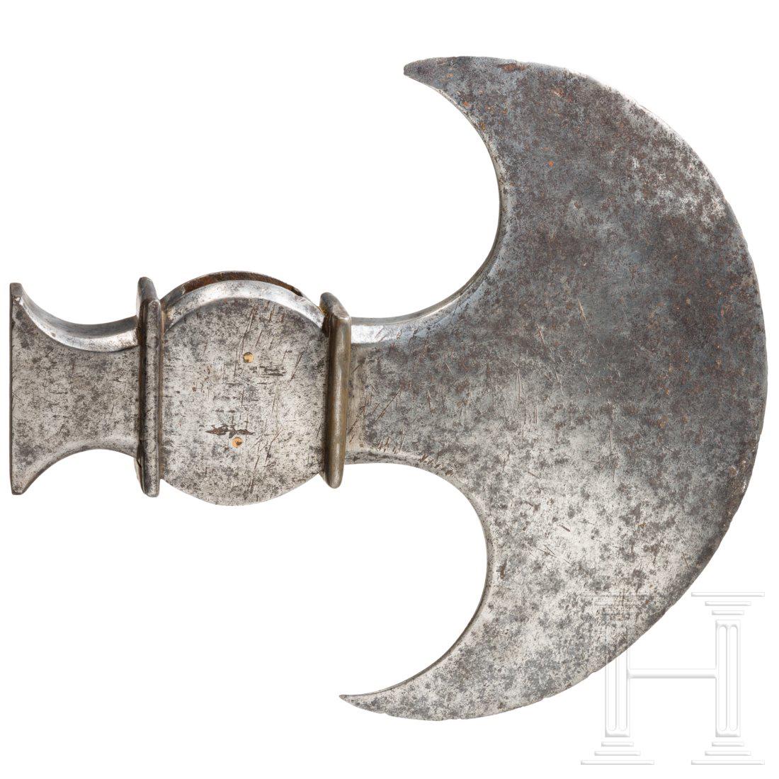 A heavy axe head for sappers (porta-machado), circa: Large and heavy, crescent-shaped blade. Square socket with hammer head on the reverse side. Height of the blade 32,5 cm, length 29 cm. Condition: II
