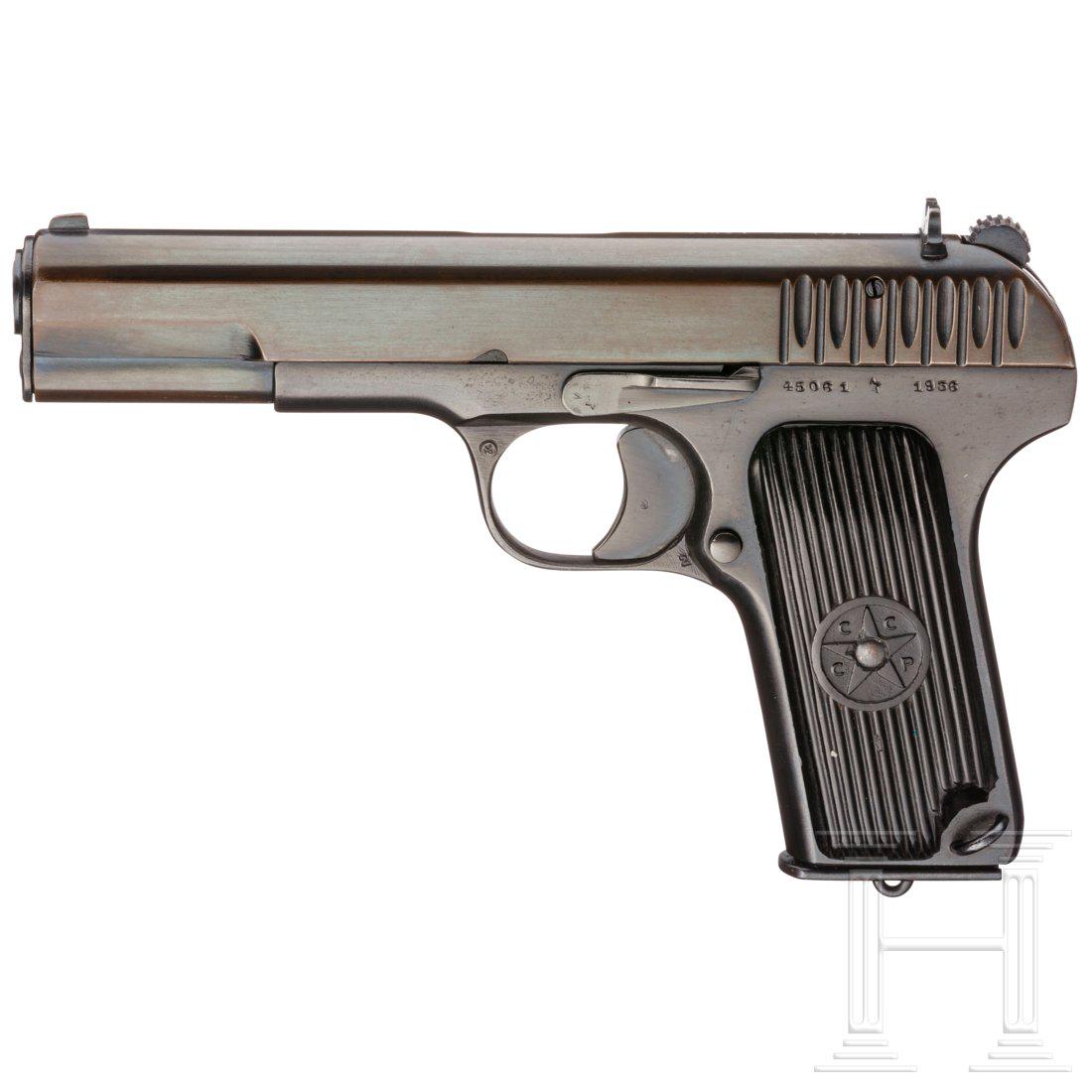 Tokarev TT 33, with holster: Cal. 7,62 mm Tok., SN. 45061, SN. Beschuss. Cal. 7,62 mm Tok., Nr. 45061, Almost bright bore. German proof marks. Built in 1936. Reworked, reblued. Matching numbered magazine. Holster with spare mag a