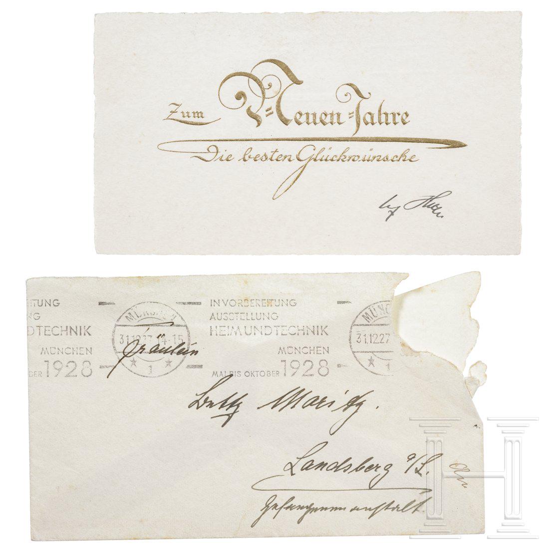 Betty Moritz â€“ a New Year card from Hitler at the: Small card (80 x 140 mm) with raised inscription (tr.) "For the New Year â€“ Best wishes" embossed in gold, underneath it handwritten ink signature "Adolf Hitler". Envelope addressed to (tr.) "Mi