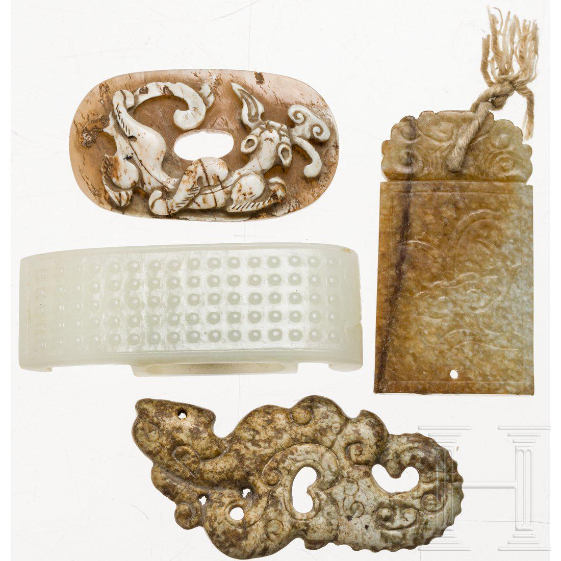 Four Chinese jade carvings in archaic style, 19th (1 of 2)