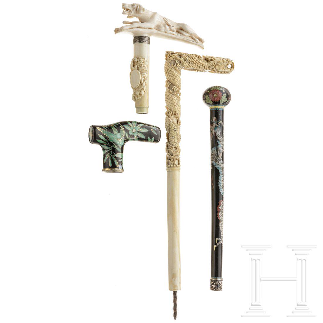 Two German and Chinese cane hilts and two umbrella (1 of 2)