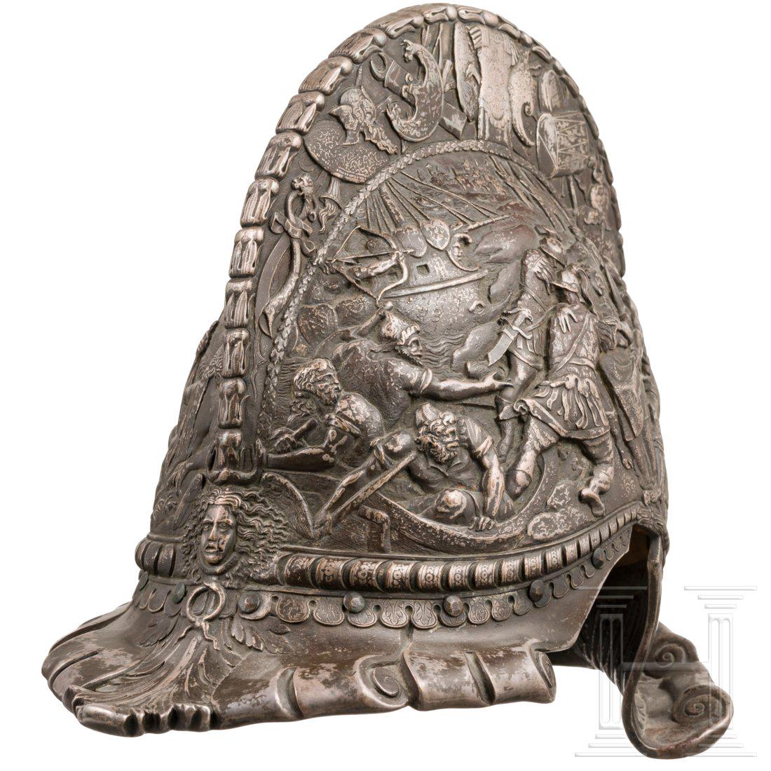A splendid German historicism burgonet in copper die: The helmet forged in one piece in copper casting, with antique-style relief dÃ©cor. Battlefield and allegorical scenes on the sides of the skull, trophy dÃ©cor on the comb. Hollow-wrought peak and