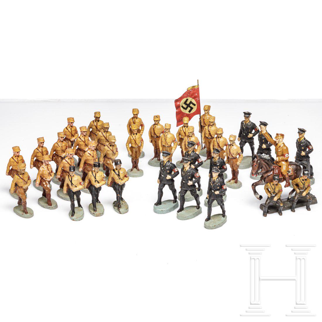 A collection of Lineol and Elastolin SA and SS toy: Konvolut Massefiguren der Hersteller "Elastolin" und "Lineol", 6/7 cm- Serie, 30er Jahre, dabei verschiedene SA- und SS-Marschierer, stillgestandene, dabei ein SA-Musiker mit abgesetzter Trompete, SA-