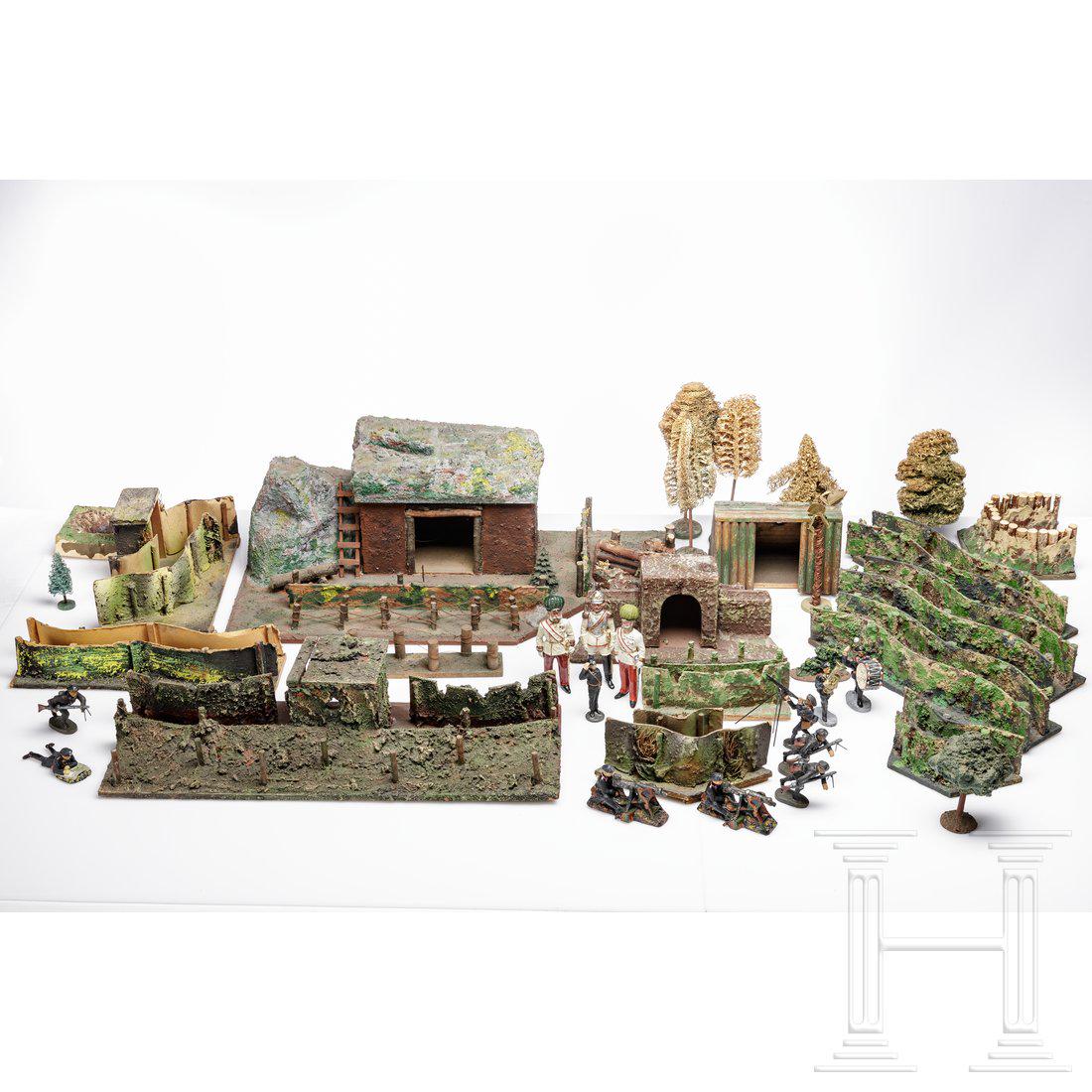 A collection of Gottschalk and Hausser trenches and: Konvolut UnterstÃ¤nde und Figuren; dabei ca. 25 Elastolin-Panzersoldaten, unterschiedliche Darstellungen, alle Figuren teils oder komplett neu bemalt bzw. heutige Produktion; ca. zehn UnterstÃ¤nde