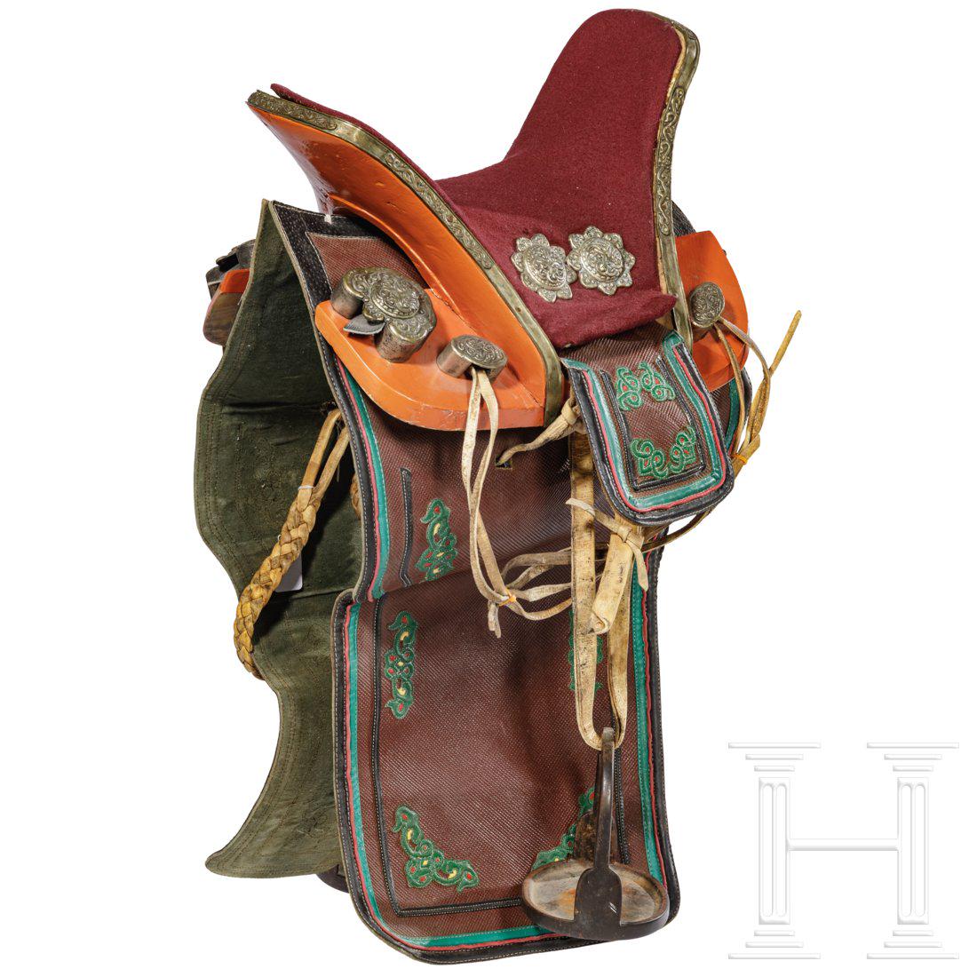 A richly decorated Sino-Tibetan saddle, 20th century (1 of 3)