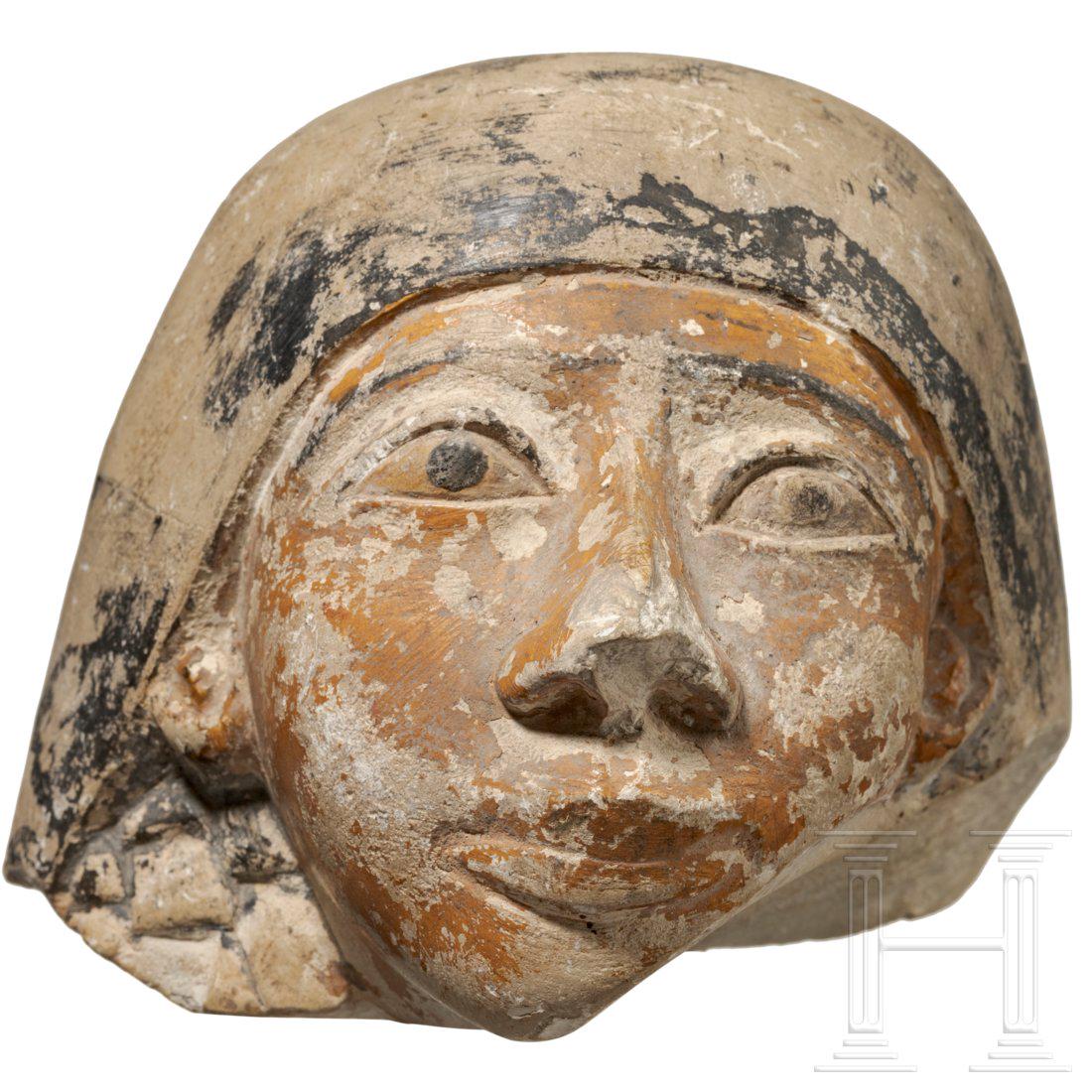 An Egyptian canopic lid, 2nd - 1st millennium B.C. (1 of 5)
