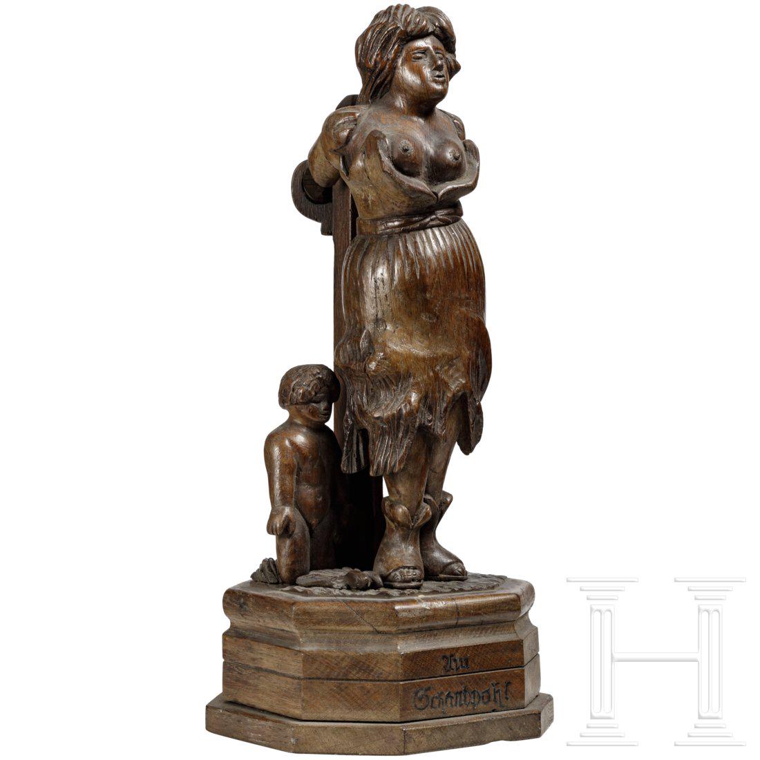 A witch presented at the pillory, German, circa 1920 (1 of 5)