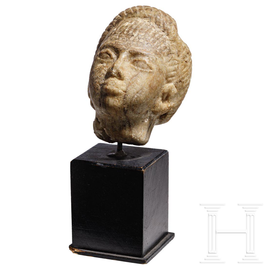 An Egyptian alabaster head, 2nd - 1st millennium B.C. (1 of 4)