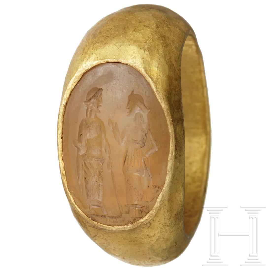 A large Roman golden ring with gemstone, 1st - 2nd (1 of 3)