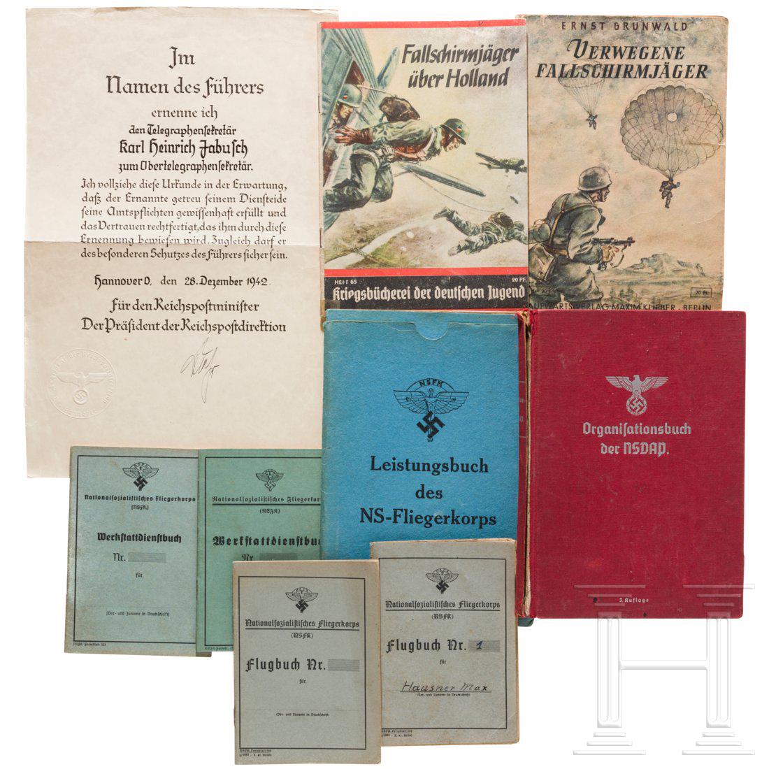 An NSDAP organization book 1937, identity cards and: An NSDAP organization book 1937, identity cards and documentsBuch "Organisationsbuch der NSDAP", 3. Auflage 1937, 556 Seiten und reichlich bebildert, Einband beschÃ¤digt, sonst gut. Urkunde zur Bef�