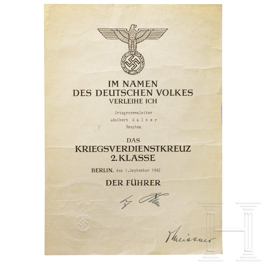 A award certificate to the KVK for the: A award certificate to the KVK for the Ortsgruppenleiter of the city of KemptenGroÃŸe Schmuckurkunde mit BlindprÃ¤gesiegel und Faksimile-Unterschriften vom 1.09.1942. Gefaltet und knittrig.Conditi