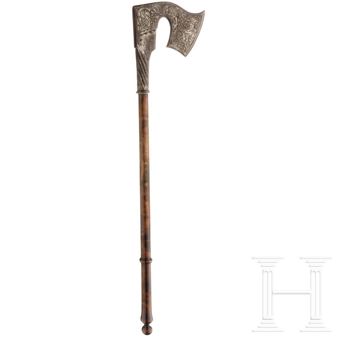 A battleaxe, collector's replica of the historicism,: A battleaxe, collector's replica of the historicism, late 19th centuryGebartetes Axtblatt mit angegossener, spiralig geformter und gravierter TÃ¼lle (Reste von Versilberung), das Blatt selbst mit re