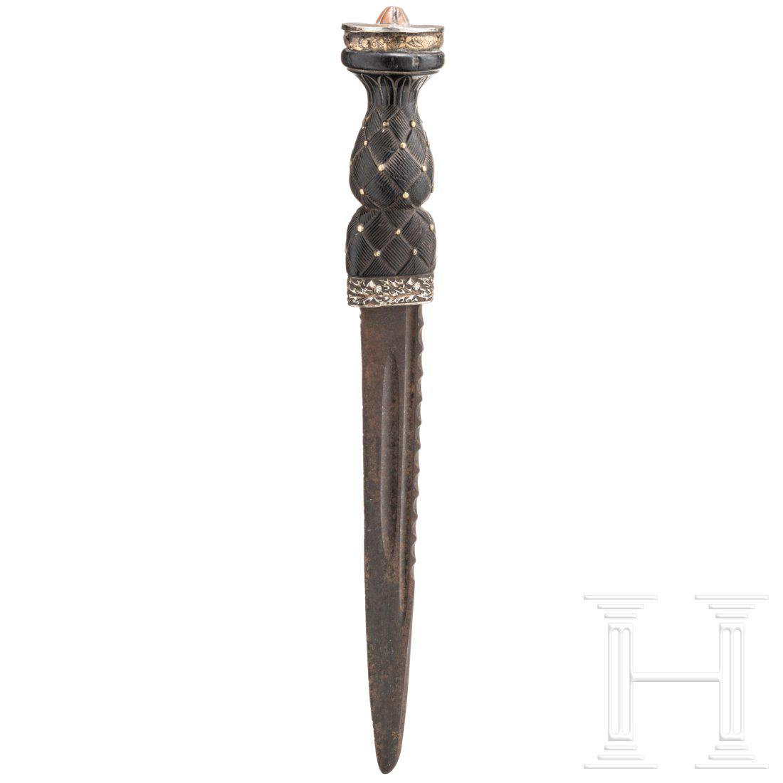 A Scottish military dirk, 1st half of the 19th century: A Scottish military dirk, 1st half of the 19th centuryKrÃ¤ftige RÃ¼ckenklinge mit zweischneidiger, leicht gerundeter Spitze und dunkler Alterspatina. Beidseitig je doppelte schmale Kehlung. Relief
