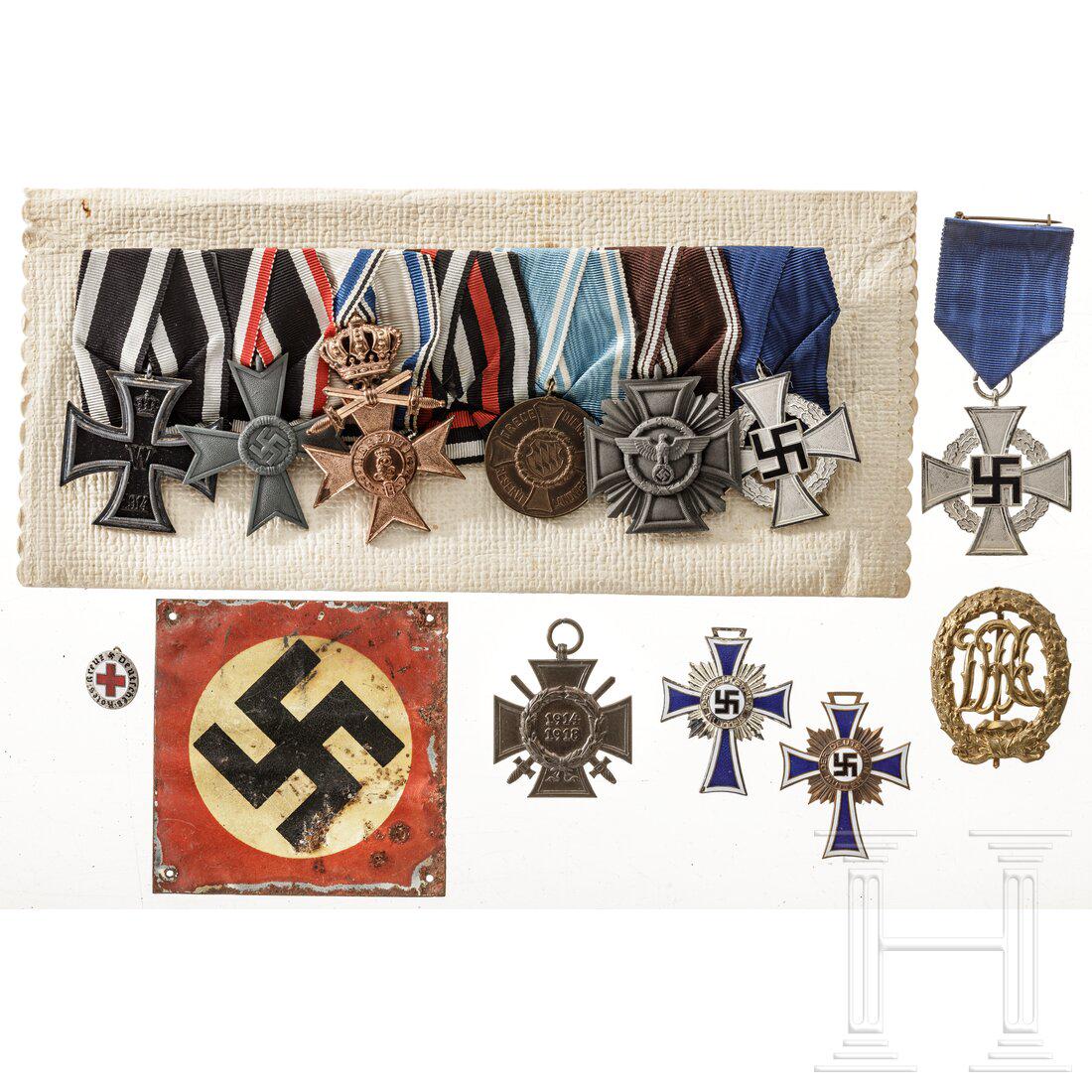 A seven-piece Bavarian medal bar: A seven-piece Bavarian medal bar EK 2 1914, KVK 2. Klasse, MVK 3. Klasse mit Krone und Schwertern, FEK (lose beiliegend), Landwehr-DA II. Klasse, DA der NSDAP in Bronze, Treuedienst-Ehrenzeichen für 