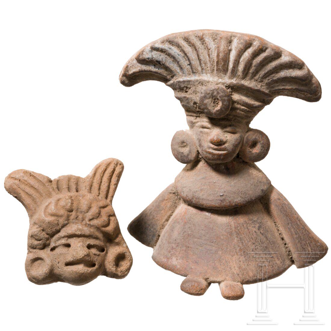 A Central American terracotta figure and an applike,: A Central American terracotta figure and an applike, circa 500 – 1500 Small figure with high headdress and big earrings. Under the long robe protruding feet. Intact. Height 5 cm. Comes with a cl