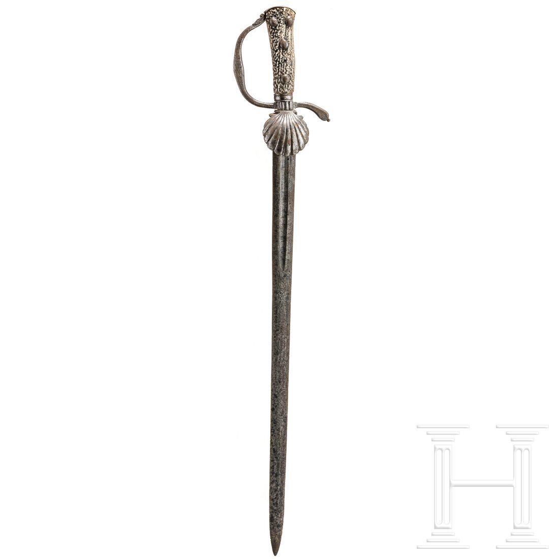 A German hunting hanger, 18th century: A German hunting hanger, 18th century Ältere zweischneidige Klinge mit kurzen Hohlkehlen, darin unleserliche Inschriften, darüber beidseitig Wolfsmarke. Eisernes, geschnittenes Bügelgef
