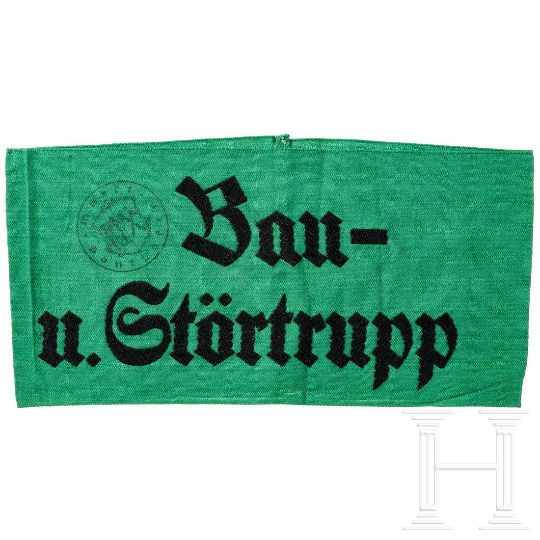 An armband of the "Bau- u. Störtrupp": An armband of the "Bau- u. Störtrupp"Grünes Tuch, in Schwarz gewebte Schrift, seitlich Stempel "Markt Sonthofen", rs. Herstellerbezeichnung "Erha-Wuppertal". Wenig getragen, selten.Condition