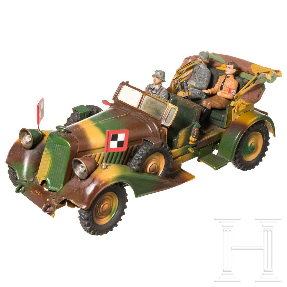 A Lineol Kuebelwagen 1200/5, "WH 4716", with Flak crew: A Lineol Kuebelwagen 1200/5, "WH 4716", with Flak crewLineol, Blech-Masseausführung, 7 cm-Serie, 30er Jahre. Ein Kübelwagen 1200/5, mimikry, Ausführung mit doppeltem Boden, Uhrwerk l