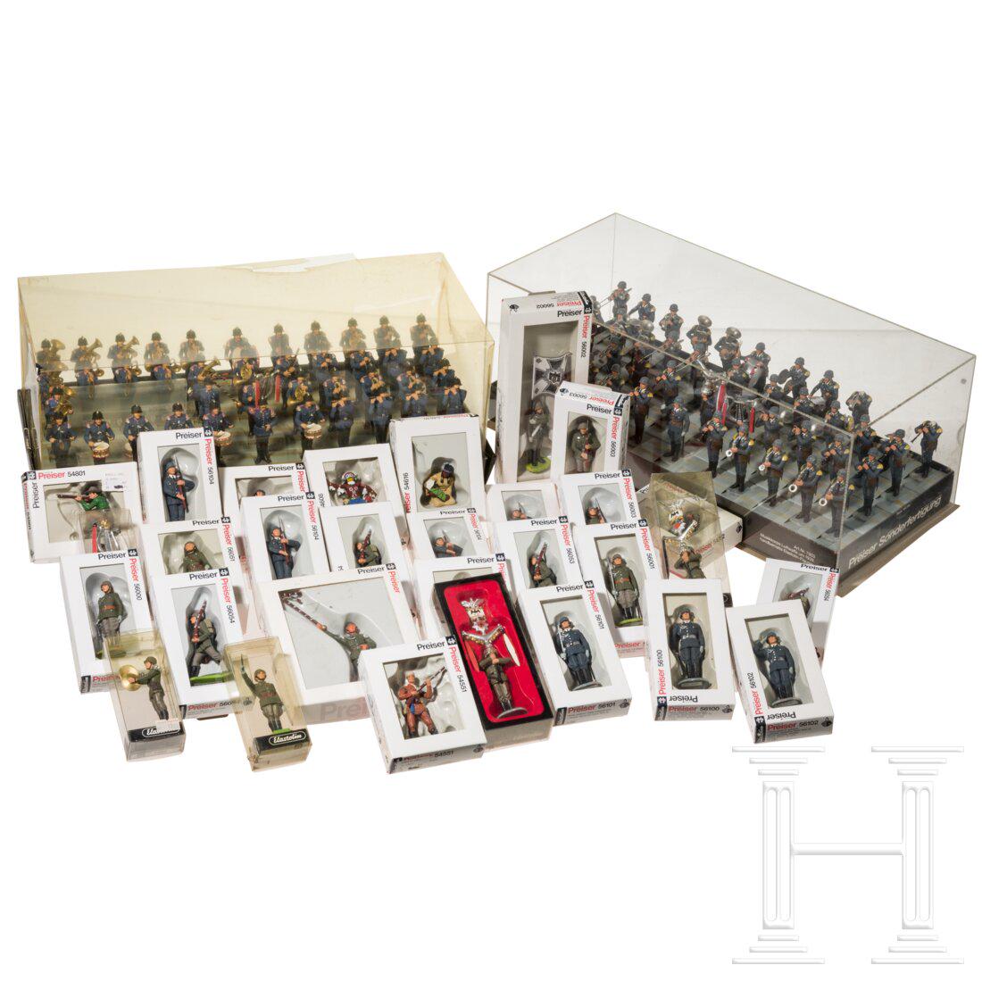 A group of Elastolin and Preiser - 30 plastic soldiers and Wild West figures in original boxes, plus: A group of Elastolin and Preiser - 30 plastic soldiers and Wild West figures in original boxes, plus two limited edition boxes of a fire police and a Luftwaffe bandElastolin/Preiser, Hart-Plastik/Kuns