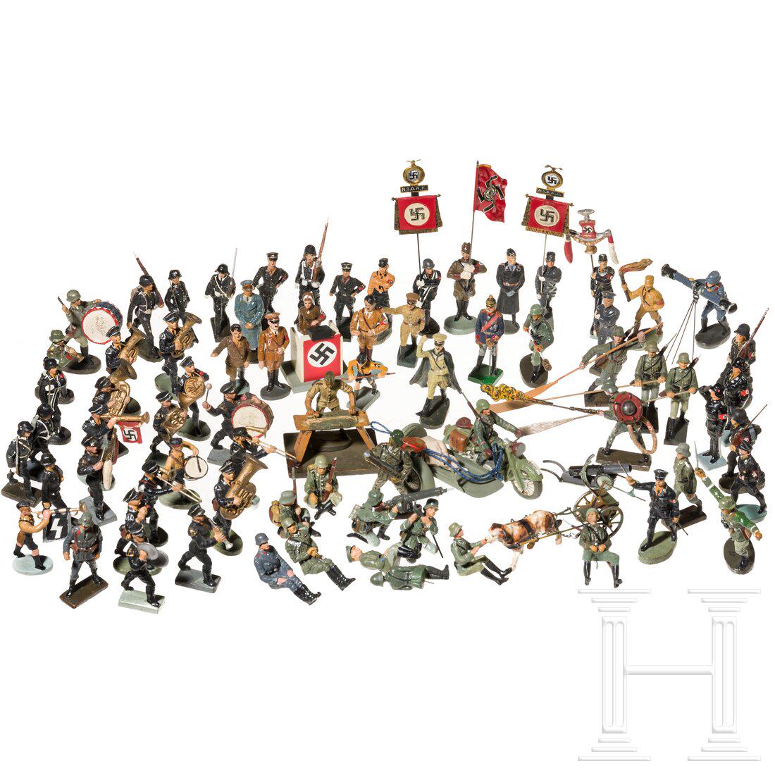 A large group of approx. 70 figures, with Elastolin and Lineol: A large group of approx. 70 figures, with Elastolin and LineolGroßes Konvolut mit ca. 70 Figuren der SA, SS, HJ, Pimpfe, ein Motorrad mit Beiwagen, ein Paukerwagen mit Zughund, ein Rednerpult, St