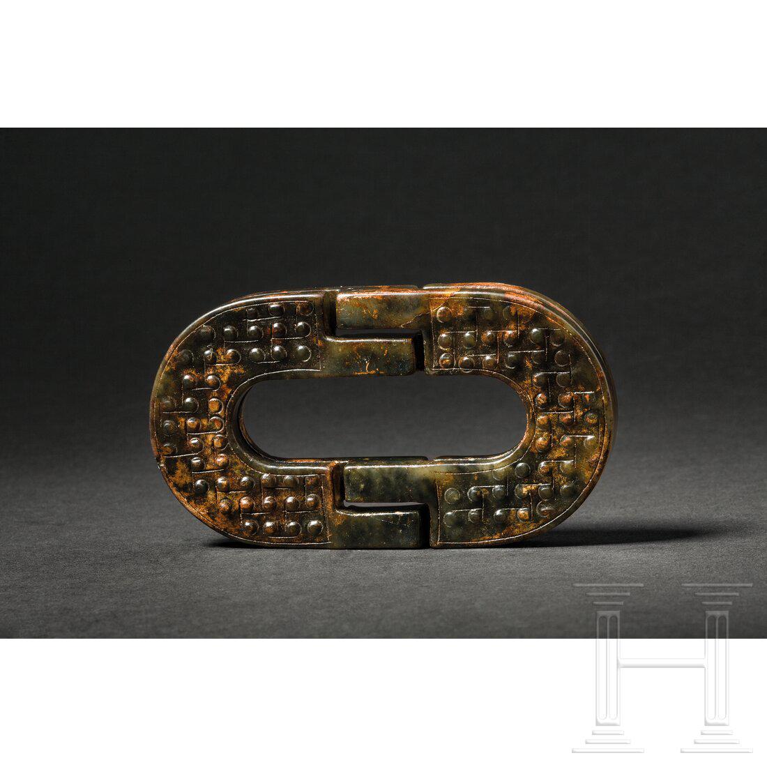 A Chinese interlinked double jade object, 20th century (1 of 4)