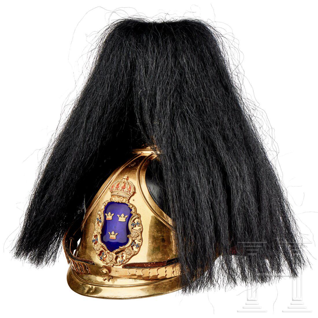 Officer Swedish Cavallerie Helmet: Officer Swedish Cavallerie HelmetBlack lacquered leather body, front and rear visor, the front visor with green underlay, rear visor with red underlay. Gilt: round spike base, stars, spine, trichter a