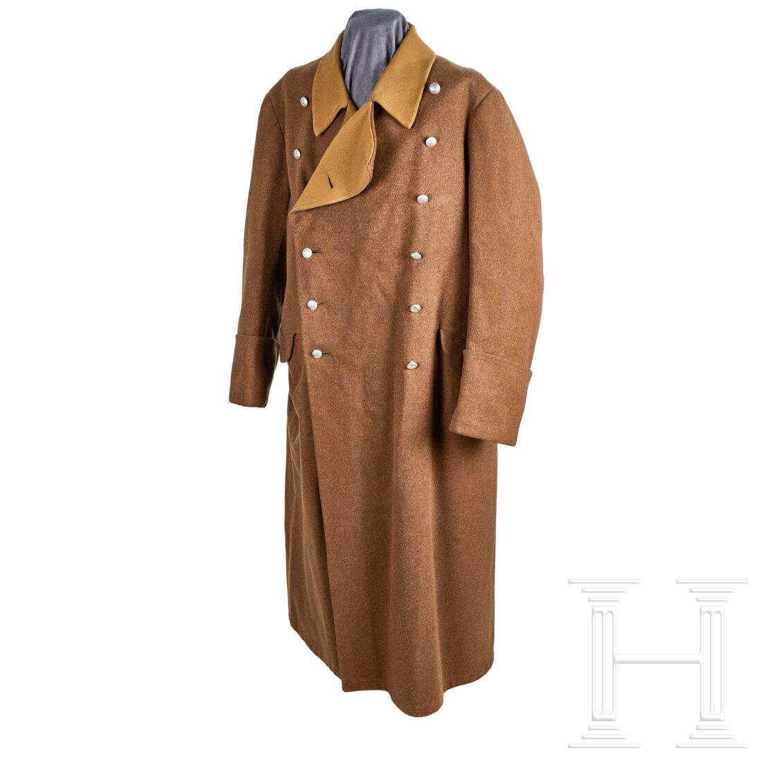 An NSDAP Greatcoat: An NSDAP GreatcoatBrown wool, double-breasted, open collar and lapels covered in light brown tricot, two slash hip pockets with curved flap closure, 12 silver pebbled buttons with party eagle. Rear ve