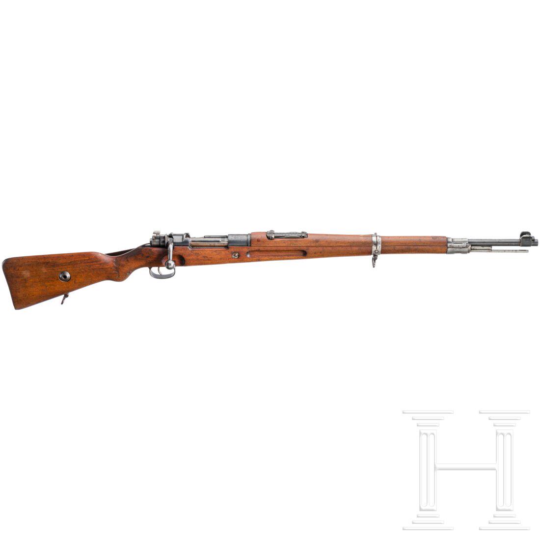 RepetierbÃ¼chse, P.F.K. Warszawa, Karabiner Mod. K 98: RepetierbÃ¼chse, P.F.K. Warszawa, Karabiner Mod. K 98 Cal. 8x57JS, SN. 33991, nicht nummerngleich. Lauf leicht matt. FÃ¼nfschÃ¼ssig. GÃ¼ltiger Beschuss. HÃ¼lsenkopf gemarkt "Poln. Adler / P.