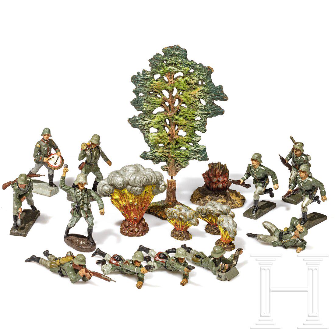 Twelve Lineol and Elastolin fighting soldiers, a fir tree and five grenade explosions: Twelve Lineol and Elastolin fighting soldiers, a fir tree and five grenade explosionsKonvolut, Lineol/Elastolin, 30er Jahre, 7 cm-Serie, MasseausfÃ¼hrung; dabei sieben Lineol-KÃ¤mpfende mit Sturms