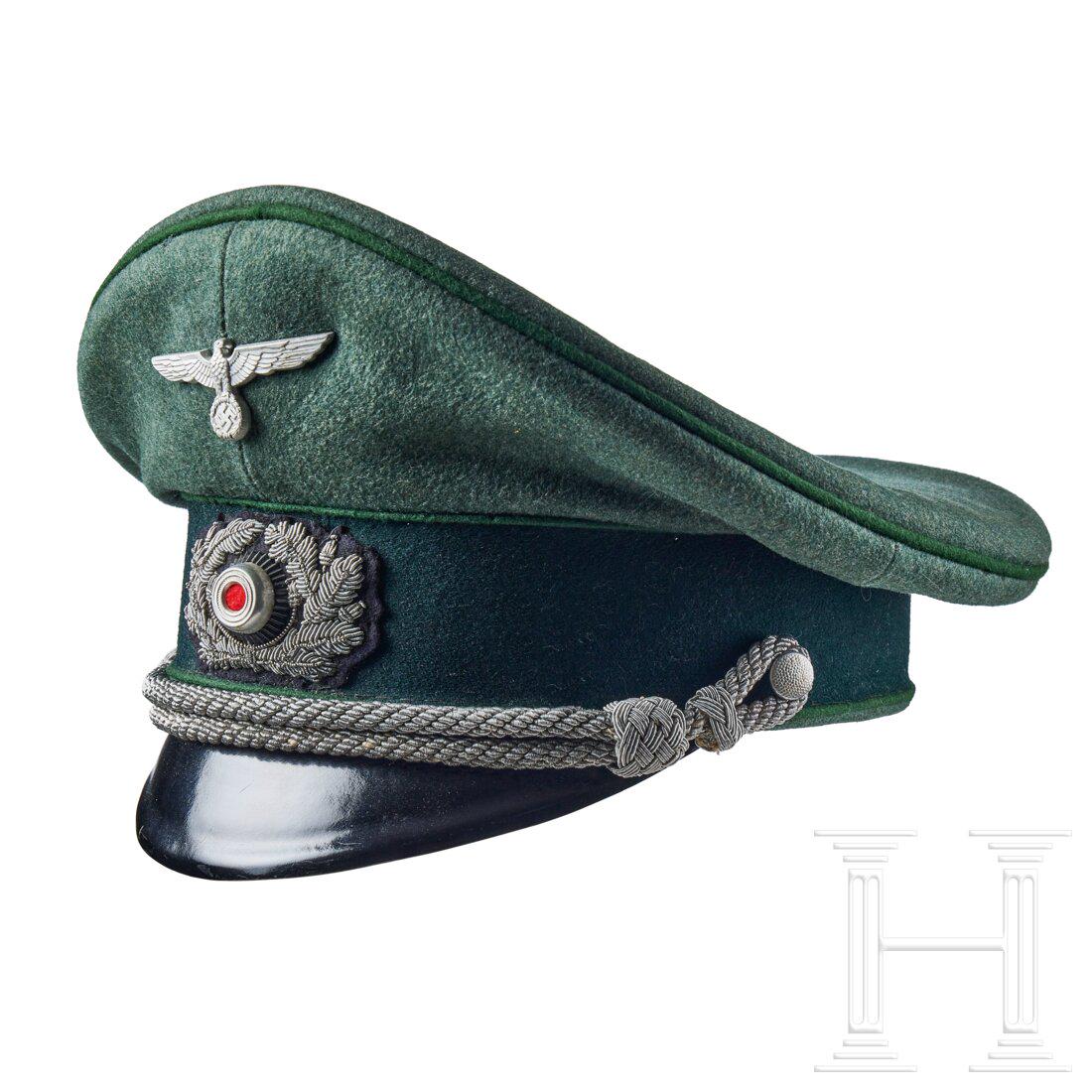 A Visor Cap for Administrative Officers: A Visor Cap for Administrative OfficersCap body in field-grey wool, green wool centre band, dark green wool piping, silver-aluminum chin cords retained by silver finished pebbled buttons. Silver finis
