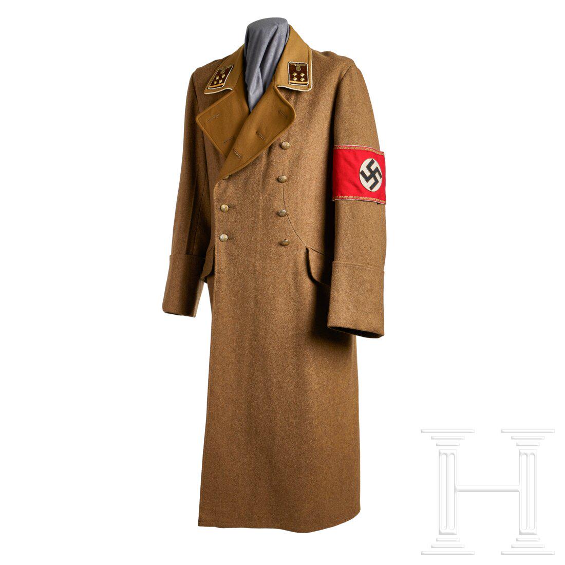A Political Leader Great Coat: A Political Leader Great Coat Light-brown wool, double-breasted full-length coat, French cuffs, collar and lapels lined with light-brown fine tricot cloth and piped in white rayon. Six pairs of gilt f