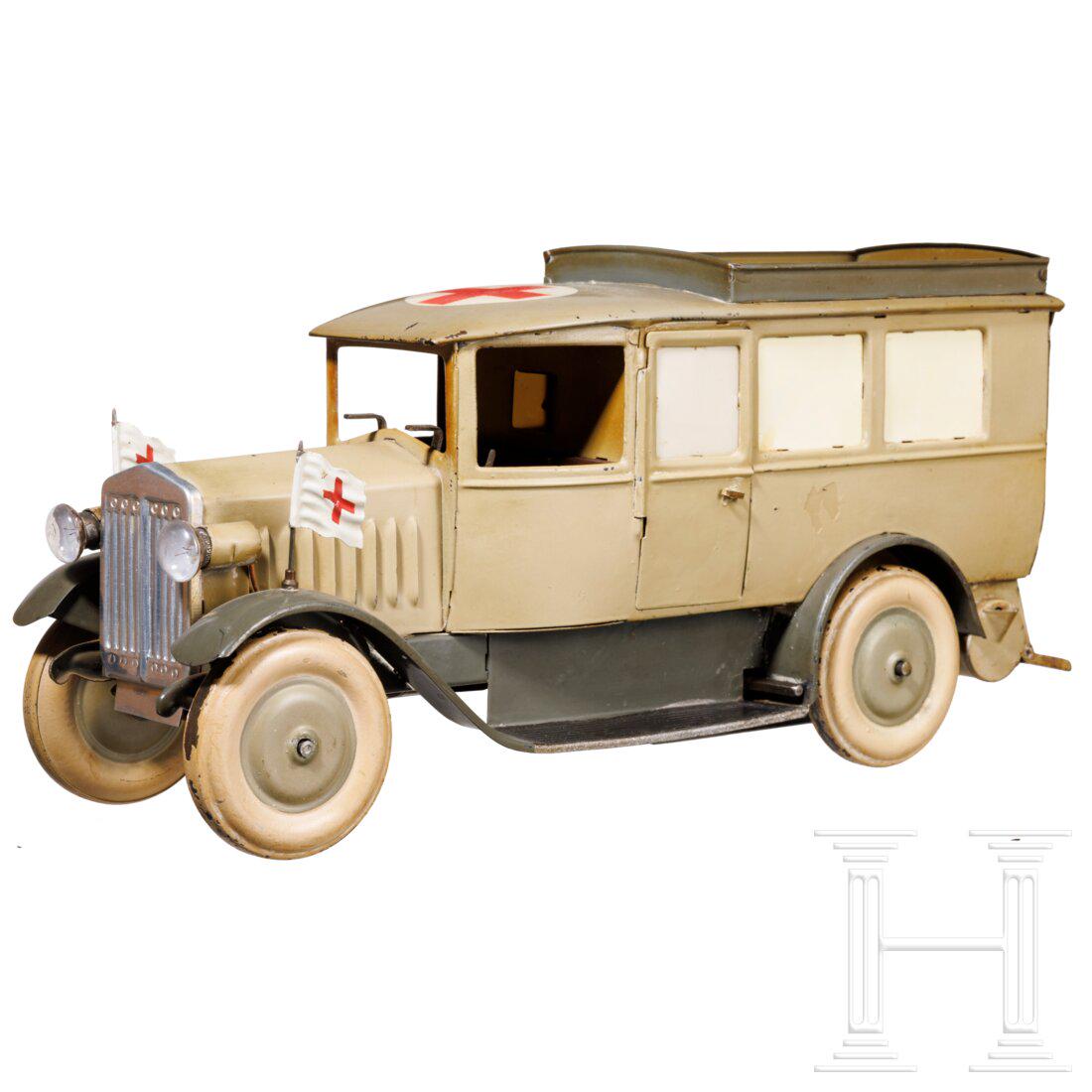 A Lineol SA Ambulance 1041 in grey-beige: A Lineol SA Ambulance 1041 in grey-beigeLineol, Blech-MasseausfÃ¼hrung, frÃ¼he 30er Jahre, 7 cm-Serie. Ein SA-Krankenauto 1041, in der frÃ¼hen beige-graufarbenen AusfÃ¼hrung lackiert, seltene 