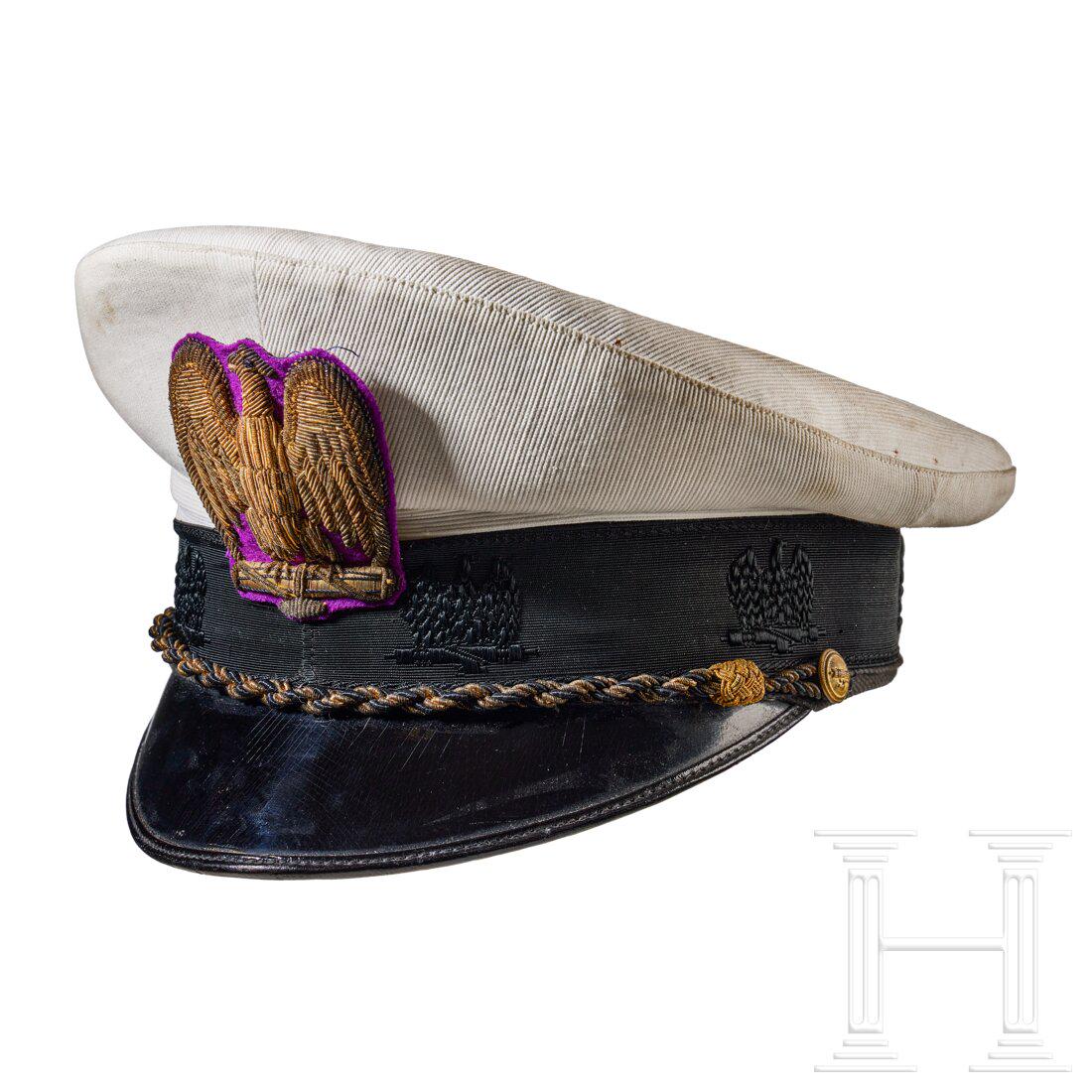 A Summer Visor Cap for Italian Government Official: A Summer Visor Cap for Italian Government OfficialCap body in white ribbed fabric, black ribbed rayon centre band with machine-embroidered eagle and fasces motif, alternating gilt and black wire braid