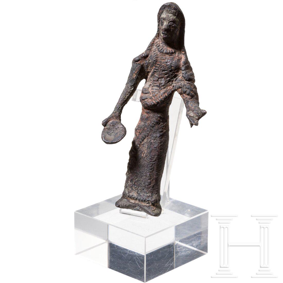 An Etruscan bronze statuette of a sacrificing woman, 4th - 2nd century B.C. (1 of 4)