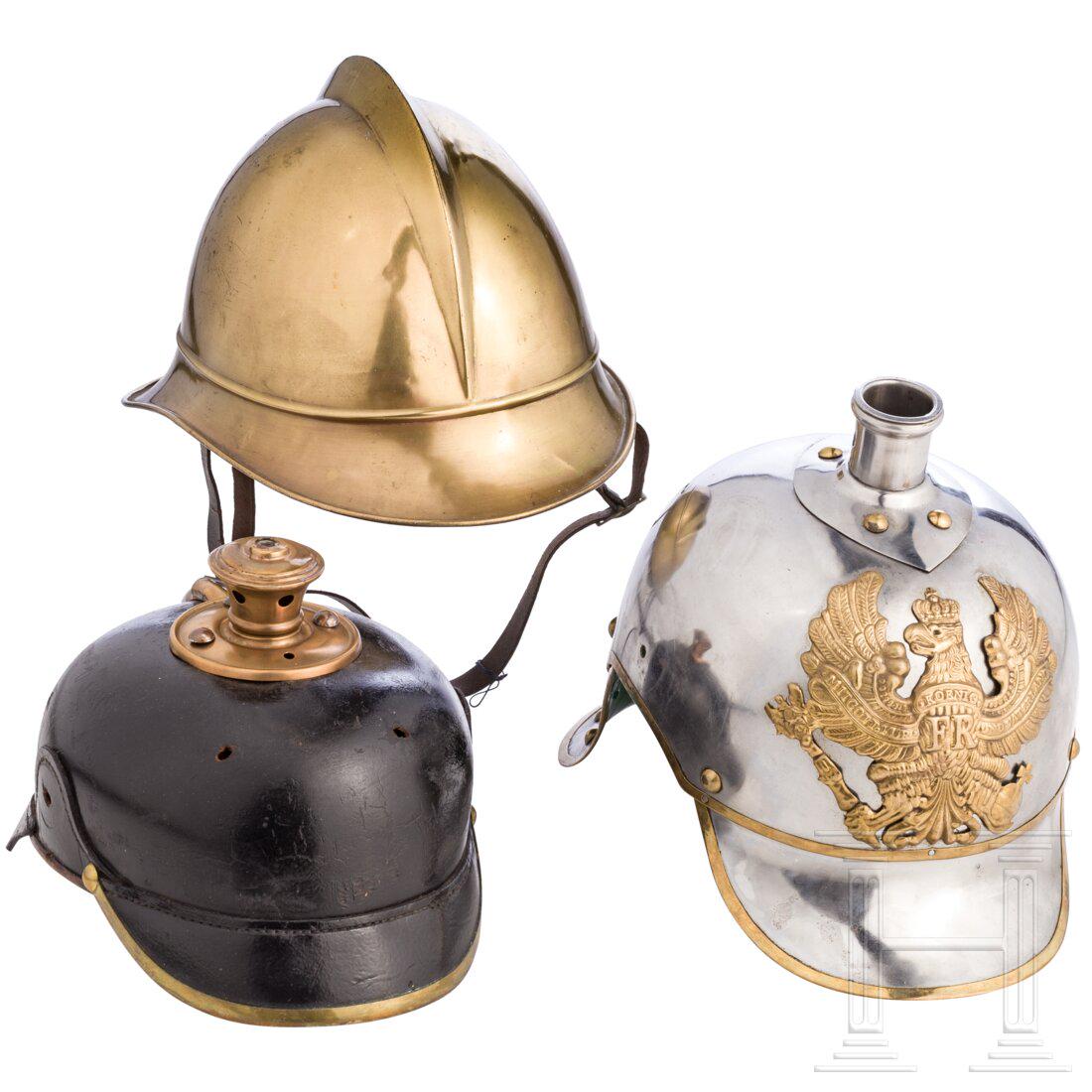 A fire fighter's helmet and two helmet fragments, 19th/20th century (1 of 7)