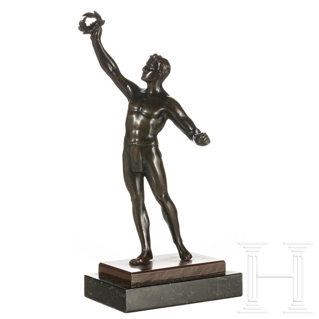 The Winner, German, 20th century: The Winner, German, 20th centuryZink, bronziert (berieben), unsigniert, auf braun lackierter Zinkplinthe, neu verschraubt mit flachem schwarzen Steinsockel (etwas bestoÃŸen). Vollplastische Ganzfigu